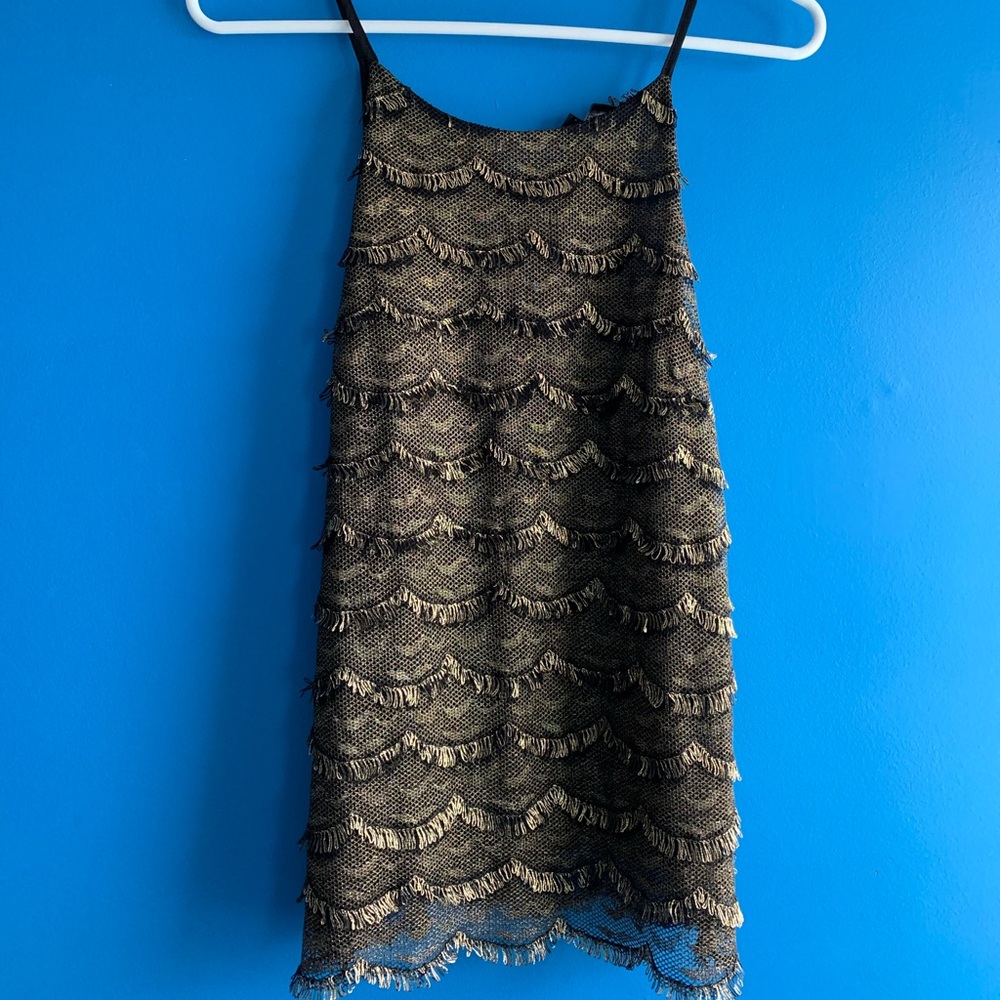 Black and gold holiday top